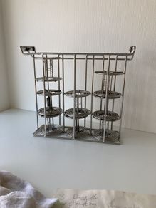 120 developing reels and cage.