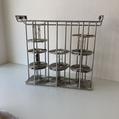 120 developing reels and cage.
