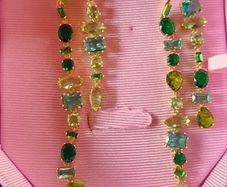 Swarovski asymmetrical drop green crystal earrings