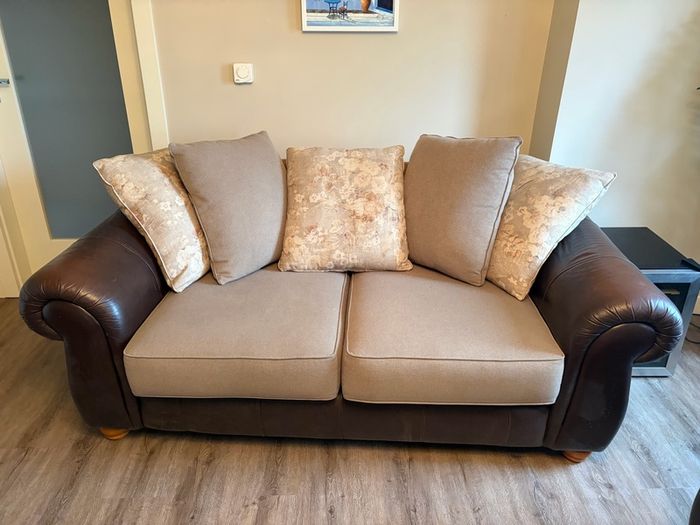 Two Sofas and footstools