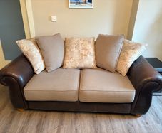 Two Sofas and footstools