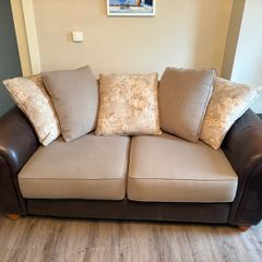 Two Sofas and footstools