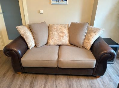 Two Sofas and footstools