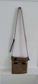 Liberty by Gionni genuine leather handbag in very good condition with lots of pockets zipped closures and adjustable shoulder strap one small mark see fourth last photo and see last three photos for exact measurements FREE TRACKED POSTAGE INCLUDED