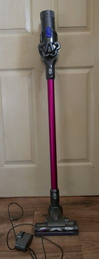 Dyson V7 Motorhead Stick Vacuum Cleaner (works well)