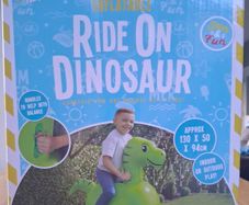 Inflatable ride on dinosaur