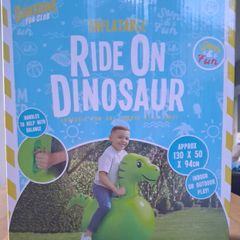 Inflatable ride on dinosaur