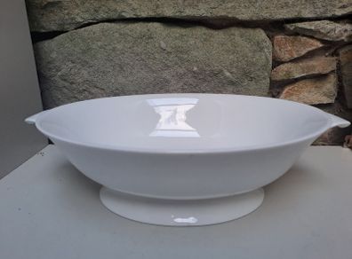 Oval white serving dish with stand