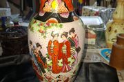 Japanese Satsuma Vase, Hand Painted Scenes typical of Japanese artistry, featuring Geishas and colorful flower motifs, Postage Available