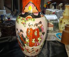 Japanese Satsuma Vase, Hand Painted Scenes typical of Japanese artistry, featuring Geishas and colorful flower motifs, Postage Available