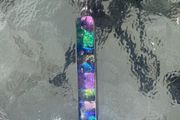 Dichoric glass pendant with silver chain