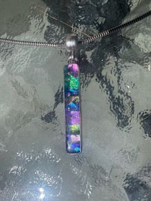 Dichoric glass pendant with silver chain