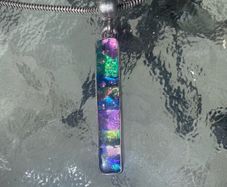 Dichoric glass pendant with silver chain