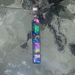 Dichoric glass pendant with silver chain