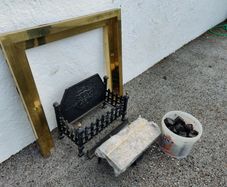 gas fire 28inch opening with brass surround