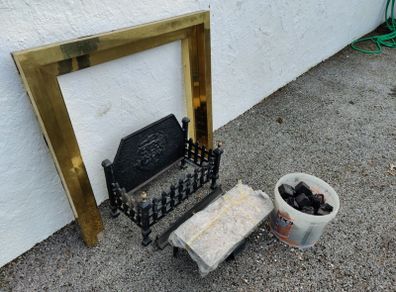 gas fire 28inch opening with brass surround