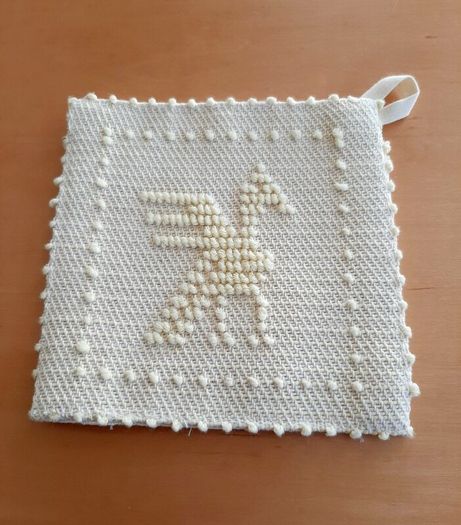 Needlepoint pot holder