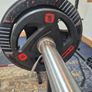 Home Gym set up w/ plates and kettlebells Image 6