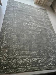 green faded look rug
