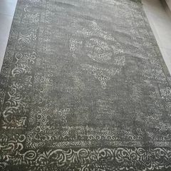 green faded look rug