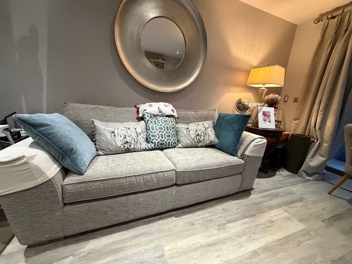 Grey fabric two-seater sofa