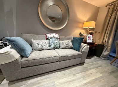 Grey fabric two-seater sofa