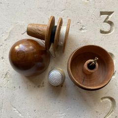 Antique wooden egg and thimble