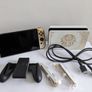 Zelda: Tears of the Kingdom OLED Nintendo Switch Console CIB + Official Breath of the Wild Switch Case + Mario Kart 8 Deluxe Image 2