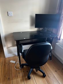 Office desk with rolling chair