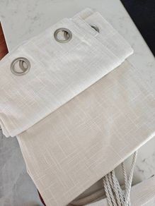 Cream curtains and matching tie backs