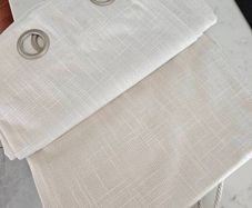 Cream curtains and matching tie backs