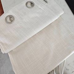 Cream curtains and matching tie backs