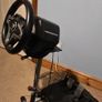 Thrustmaster T248 Racing Wheel and T3PM Pedal Set, complete with a sturdy folding metal wheel stand. Image 2