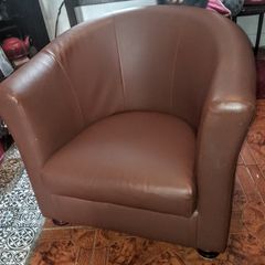 Modern tub armchair braun faux leather on turned wood legs