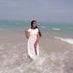 Nisha K