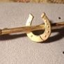 Horseshoe and Riding crop Image 2