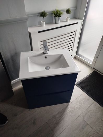 vanity unit with basin, tap and drawers dark blue. Size 600 mm.