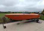 Sharp 19 with Yamaha F150 and trailer