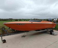 Sharp 19 with Yamaha F150 and trailer