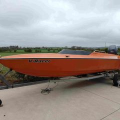 Sharp 19 with Yamaha F150 and trailer