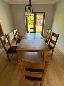 Extendable dining table and chair set for sale
