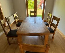 Extendable dining table and chair set for sale