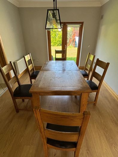 Extendable dining table and chair set for sale