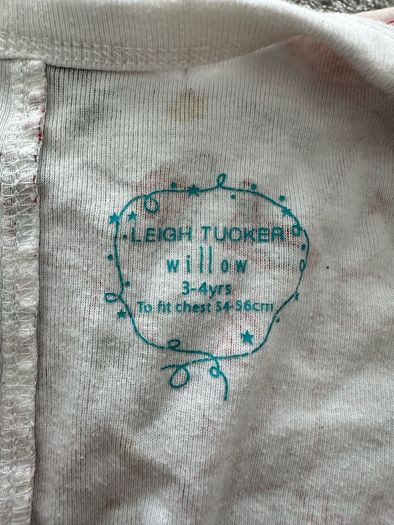 Christmas onesie with a cute bow at the back, 3-4 years (will fit a bigger child)