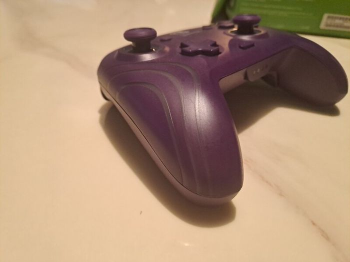 Nintendo Switch PDP Afterglow Wave Purple controller