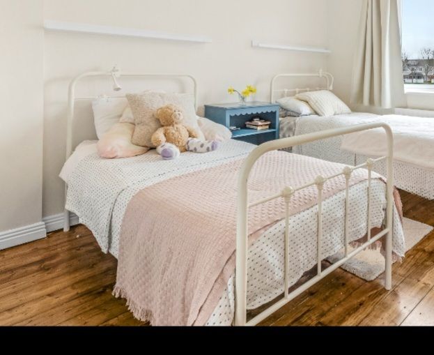 Cream metal single bed