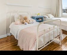 Cream metal single bed