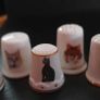 Collection of Assorted Cat Themed Thimbles Image 3