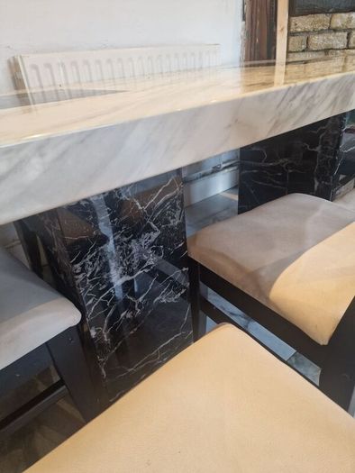 marble table and 6 chairs