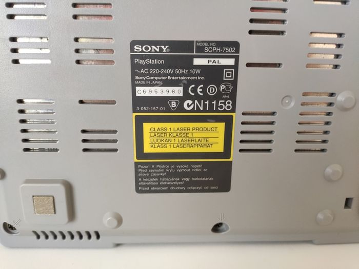 Playstation 1 console SCPH-7502 with games and cords